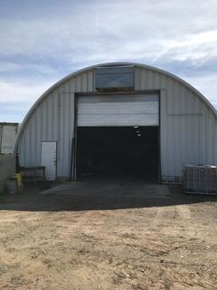 Selling Off-Site - Garage Door 14.5' X 20'. Located in Taber AB, Call Tim For Further Details (403) 968-9430.