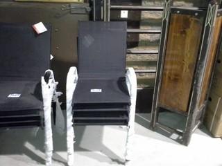 Lot of (4) Black Metal Frame Patio Lounge Chairs. 