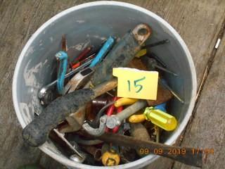 Bucket of Misc Tools. Hatchet, crescent wrench, pliers