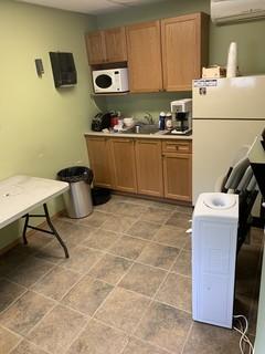 Contents of Lunch Room c/w Fridge, Microwave, Toaster, Coffee Maker, Folding Table, (4) Chairs, Contenets of Cupboard, Water Cooler