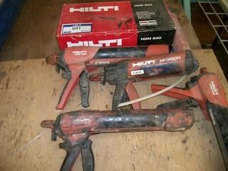 Qty Of (4) HDM500 And (1) MD2000 Hilti Manual Dispensers