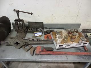 Contents of Table (table not included) Tubing cutters,pipe wrench's, tap and die