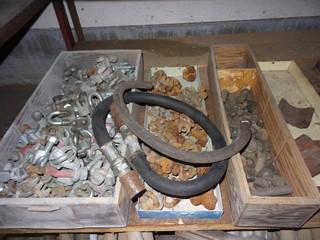 Contents of Bottom Shelf, spud wrenchs, 3/4" crosby wire rope clamps, tanner tanks(2) 3/4" air hoses(6)