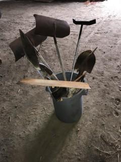 Garbage Bucket with Assorted Shovels