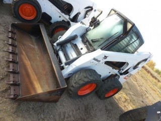 Bobcat S250 Skid Steer C/W Kubota 4 Cyl. Diesel, Q/A (HYD) Aux Hyd., A/C, 79" Tooth Bucket, 12-16.5 Tires at 40%, Showing 5,115 HRS. S/N 526011798