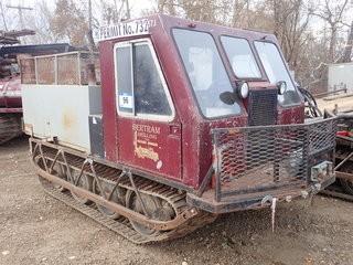 Unit 573: 1978 Bombardier Model MCD Tracked Carrier W/ 8ft Utility Bed And Water Tank. SN 321810390 **LOCATED IN CARBON**