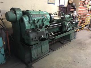 1947 Monarch Machine Tool Co. MFG# 13876 Metal Lathe., Distance Between Centre 54"., Actual Swing 16.5 deg., Catalogue Size  14" C., Drive Pulley 500 RPM.
