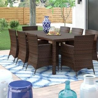 Kennerdell 9 Piece Dining Set with Cushions