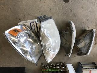 (2) Used Chev 05-06 Headlights and (4) Used Dodge Ram Head Lights