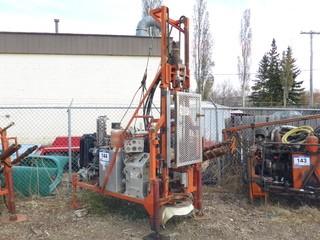 Unit 51: Heli Casing Drill C/w 4-Cyl Isuzu Diesel Engine, (5) Joints Of Pipe. Showing 380Hrs. 