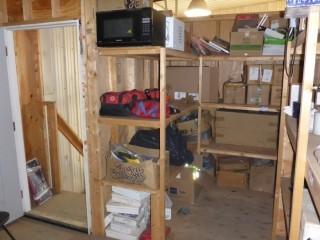 Contents Of Shelves Includes: Harnesses, Roadside Assistance Bags, Rain Suits, Microwaves And Misc Supplies