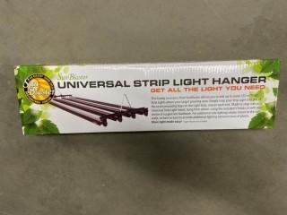 Lot of (6) Universal Strip Light Hangers.