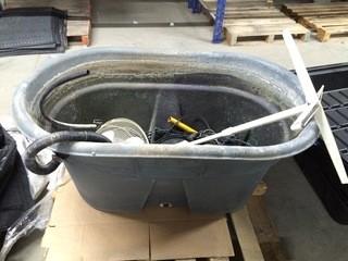 Large Water Tub Containing Pedestal Fan, Etc.