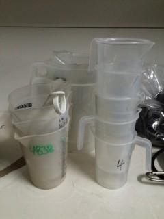 Lot of Assorted Plastic Liquid Measuring Cups.