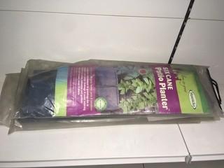 Lot of (3) Haxnicks Six Cane Patio Planters.