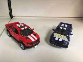 Lot of (2) Kinsmart Ford F-150 Raptor Supercrew 1:46 Scale Trucks.