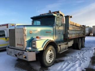 1989 International Navistar 9300 T/A Gravel Truck c/w Cummins 444, 13 Spd, Plumbed for Pup, 11R24.5 Tires. Showing 33060 Kms. S/N 2HSFEAGR4K0017493. Requires Repair. Out of Province Vehicle. Yard Use Only.
