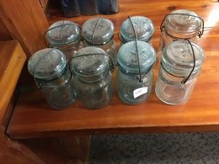 Lot of (8) Glass Jars.