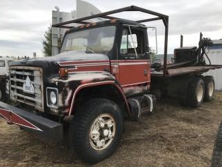 Selling Off-Site 1981 International T/A Deck Truck c/w DT466, 5/4 Gear Box. S/N 2HTAF19EXBCA23097. Located at 527 North 200 East, Raymond, AB.