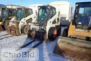 2012 Bobcat S185 Skid Steer. Kubota  V2003-M-DI-T Diesel Engine. 10.00x16.5 Tires. Auxiliary Hydraulics. Fork Attachment. Showing 1,124hrs. SN A3L944857.