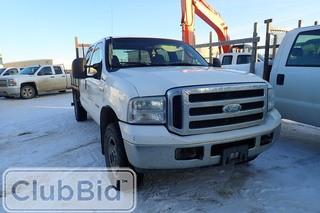 2006 Ford F-350 Super Duty XLT Supercrew Cab Flatdeck Truck. Powerstroke Diesel Engine. Automatic Transmission. Headache Rack. Showing 157,571kms. Unit PRH 118. SN 1FTWW31P26EA56071.