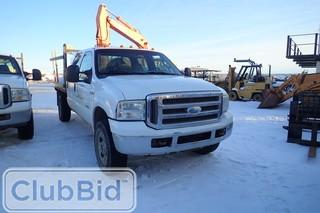 2006 Ford F-350 Super Duty XLT Supercrew Cab Flatdeck Truck. Powerstroke Diesel Engine. Automatic Transmission. Headache Rack. Showing 206,676kms. Unit PRH 119. SN 1FTWW31P36EA40039.