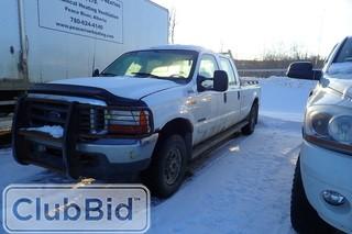 2001 Ford F-350 Super Duty XLT 4x4 Supercrew Cab Pickup Truck. Powerstroke Diesel Engine. Automatic Transmission. Oilfield Bumper. Headache Rack. Showing 359,307kms. Unit PRH 100. SN 1FTSW31F41EC97354.