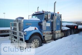 1997 Kenworth W900 Tandem Axle Texas Bed Winch Tractor. Cummins N14-460E Diesel Engine. Eaton Fuller 18-speed Transmission. Walking Beam Suspension. Aluminum Budd Wheels. 11R24.5 Tires. Tulsa Ruff-Neck Winch. Sliding 5th Wheel. Lowboy Ramps. Showing 824,664kms and 688hrs. CVIP expires 11/18. SN 1XKWD29XX1R947046.