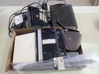 Qty Of Modems, Cords And Misc Supplies