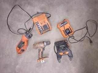 Lot of (1) Ridgid 1/2" VSR Drill, (1) Worklight, (1) Radio & (2) Battery Chargers.