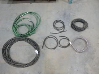 (Approx 100") 1/4" Gas Hose, (Approx 100') 1/4" Inert Gas Hose, 10' 3/4" Clear Hose, Quantity of Garden Hose, Quantity of Welding Cable (E-2,3,2)