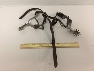 (2) Metal Spurs with Leather Straps.