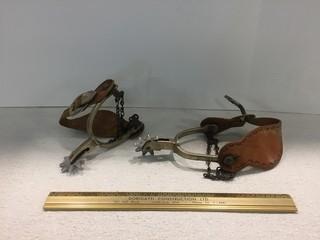 (2) Metal Spurs with Leather Straps.