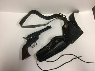 Toy Gun in Leather Holster.
