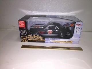 Maisto Calgary Flames Special Edition 1967 Chevy Camaro Z28 Coupe Diecast Model, 1:18 Scale.