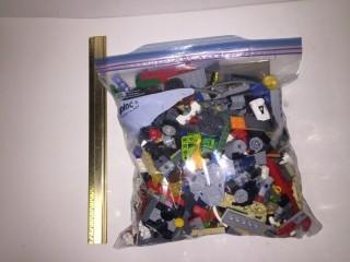 Ziplock Bag Containing Assorted Lego Pieces.