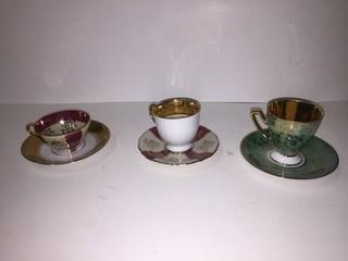 Lot of (3) Bone China Tea Cups with Saucers.