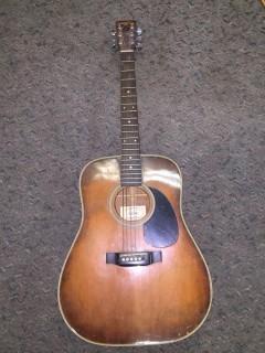 Suzuki Acoustic Guitar, Broken String.