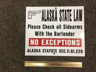 Alaskan State Law Tin Sign.