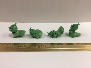 Set of (4) Caterpillar Figurines.