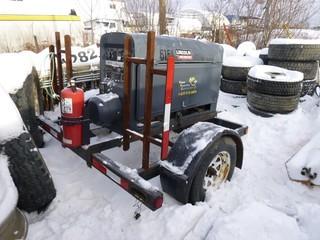 S/A Tow Behind Welding Trailer C/w Pintle Hitch, Lincoln Electric Classic III D Welder, Showing 5987 Hrs. SN 2F9U511353E080135 *Note: Running Condition Unknown*