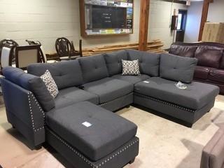 Grey Fabric Sectional, Ottoman Missing a Leg & Small Tears in Fabric as Shown.