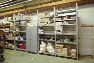 Contents of 12 Shelves Marking Chalk, Dust Pans, Coveralls, 2 Fire Extinguishers, Ridgid Vacuum Filters, etc.