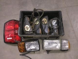 Bin of Assorted Headlights and Taillights. 