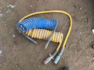 Coil Air Hose and 7 Pin Trailer Cable.