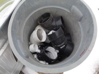 Garbage Can Containing PVC Elbows.