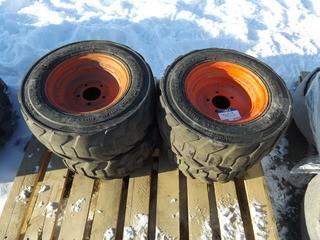 (4) Skid Steer Tubeless Tires & Rims.