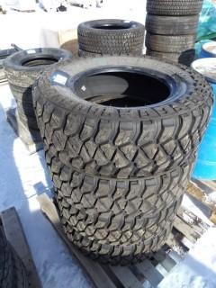 (4) LT275/70R18 Tires.