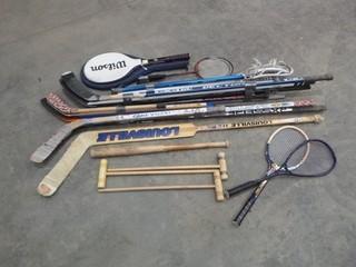 Variety of Used Sports Equipment, (2) Badminton Rackets, (4) Tennis Rackets, (2) Lacrosse Sticks, (3) Croque Mallets, Qty of Left and Right Hockey Sticks (W-W)
