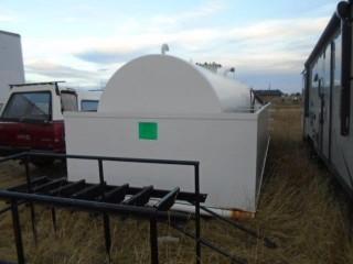 SKID MOUNTED TANK WITH SPILL CONTAINMENT. CAPACITY OF 5000 IMPERIAL GALLONS